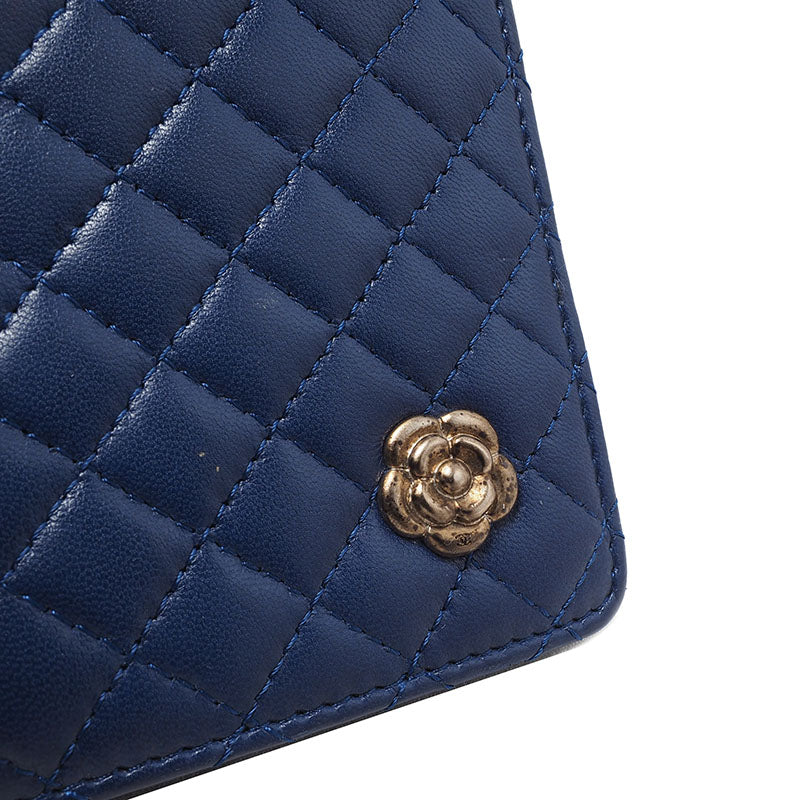 Chanel Camellia Quilted Passport Wallet