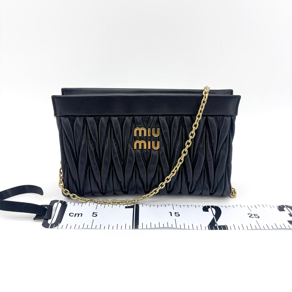 Sac à bandoulière Miu Miu en cuir nappa matelassé noir