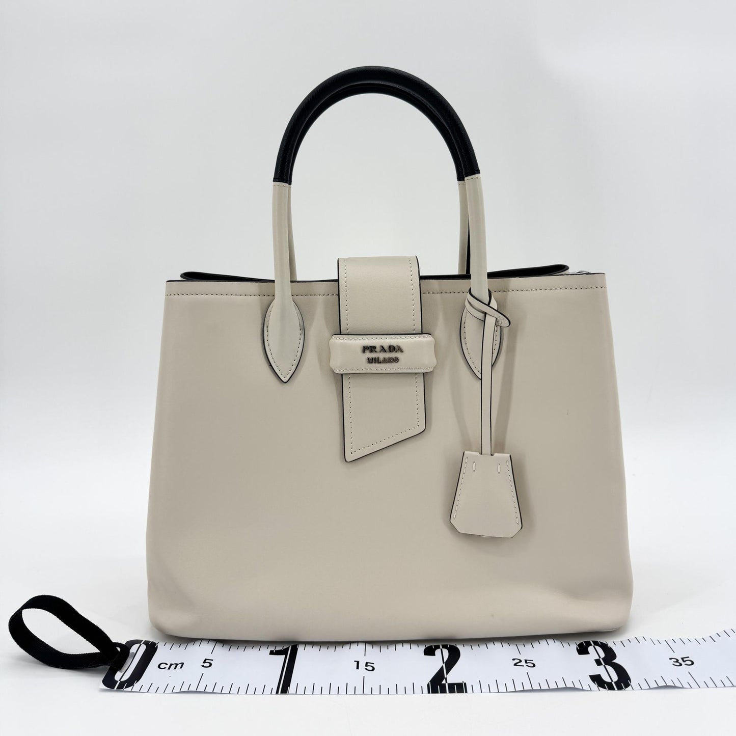 Sac cabas Prada Grace en cuir de veau, ivoire et noir