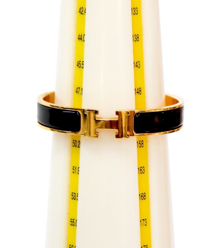 Hermès Black Click-Ash Gold Bracelet