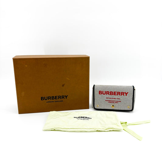 Burberry leather button detail crossbody bag strap black