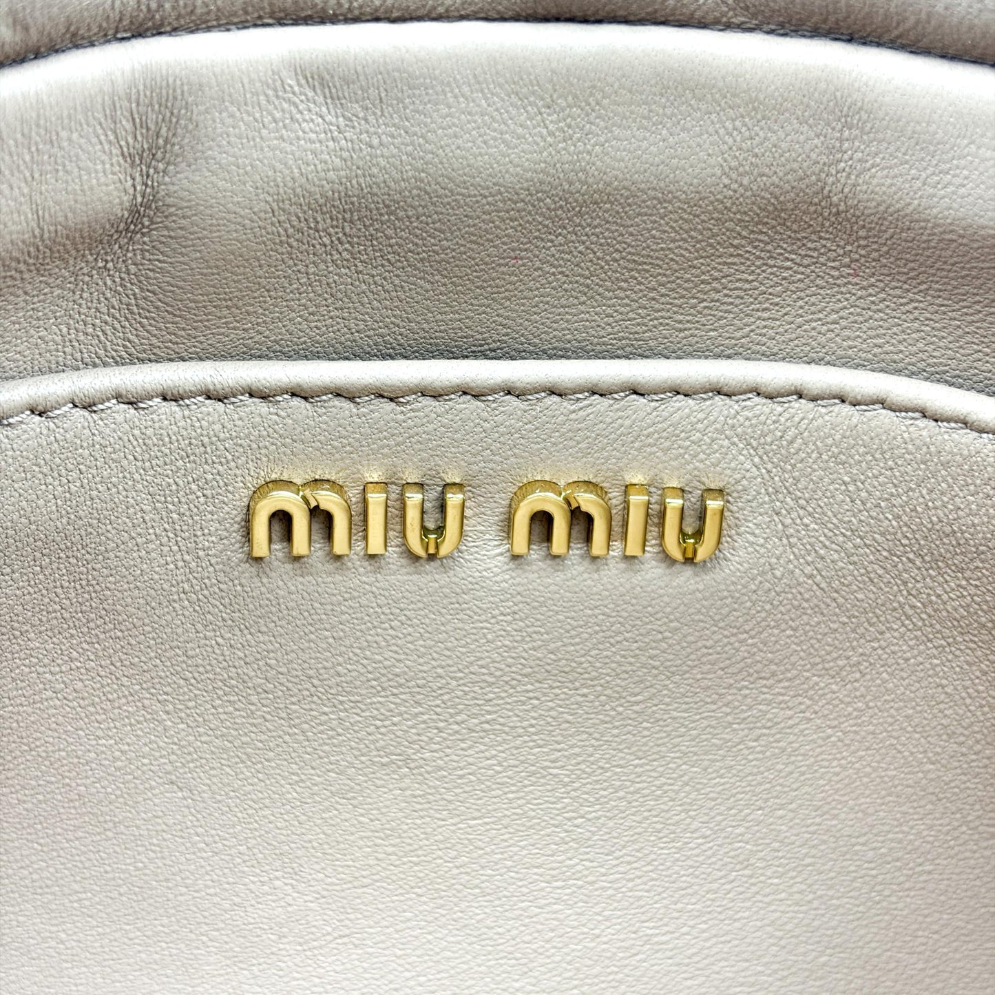 Miu Miu Matelassé Napa leather shoulder bag cameo