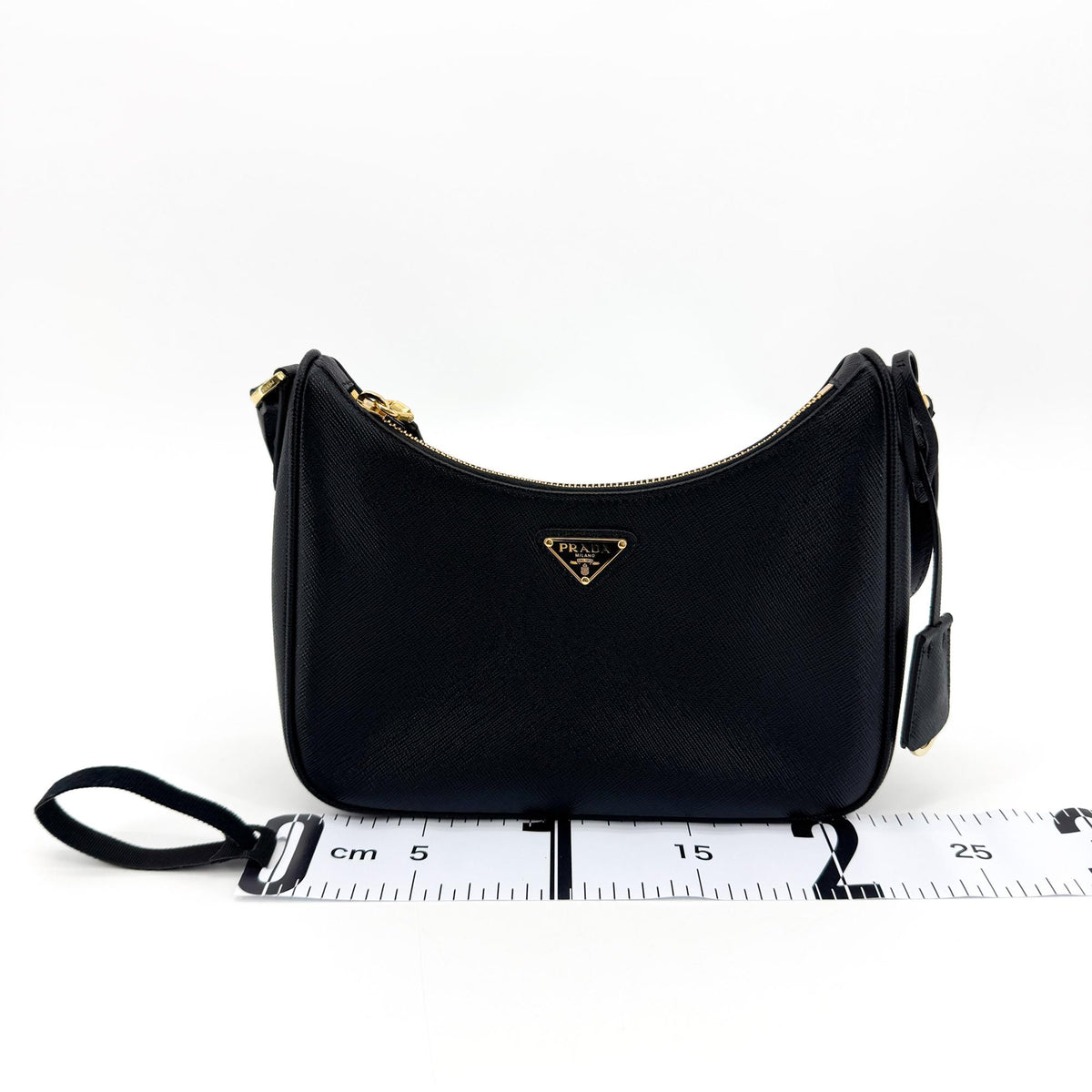 Prada Saffiano leather crossbody bag in black with gold hardware