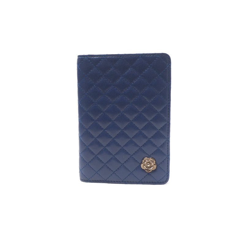 Chanel Camellia Quilted Passport Wallet