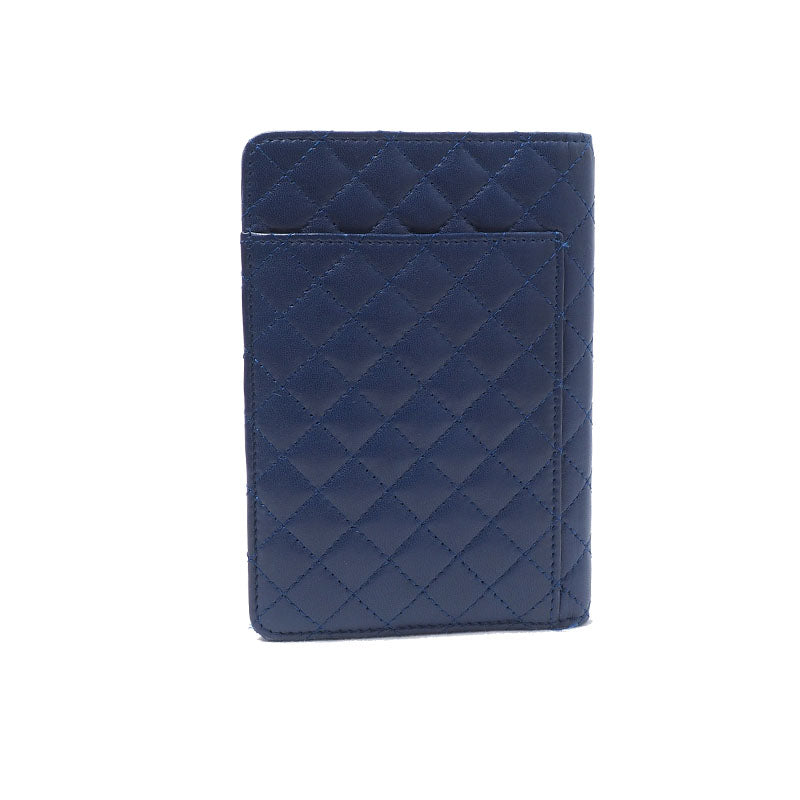 Chanel Camellia Quilted Passport Wallet