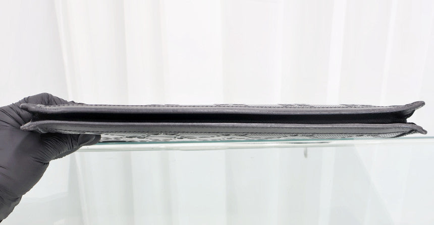 GG Embossed Pouch Clutch 646449 Department Store Product