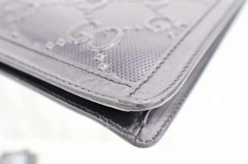 GG Embossed Pouch Clutch 646449 Department Store Product