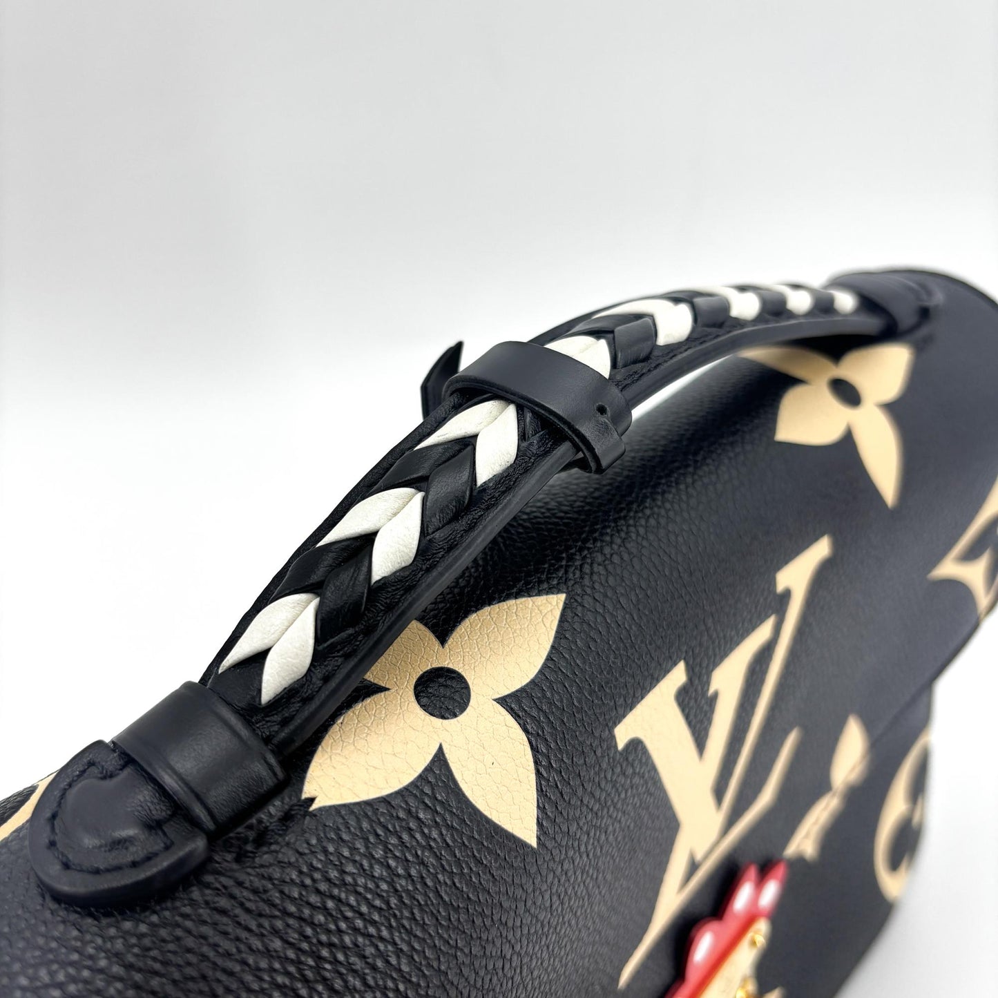 Louis Vuitton Pochette Métis Crafty Monogram Empreinte Black Cream