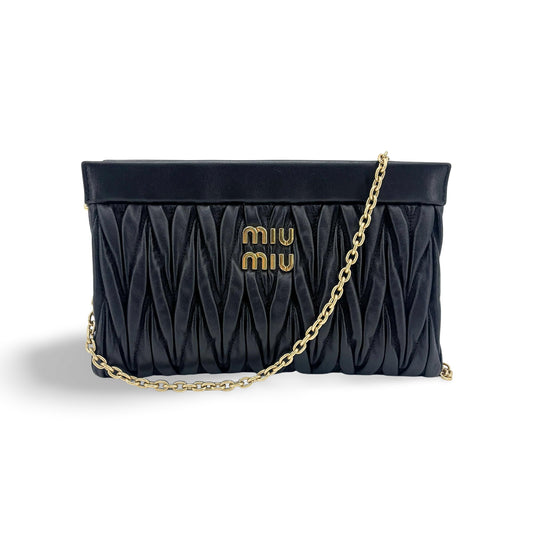 Sac à bandoulière Miu Miu en cuir nappa matelassé noir