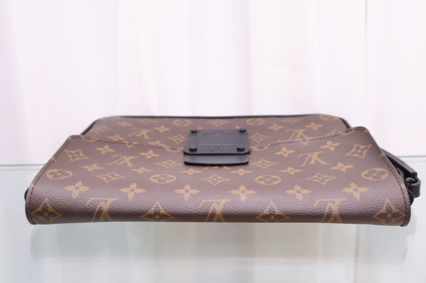 Monogram S-Lock A4 Pouch Clutch