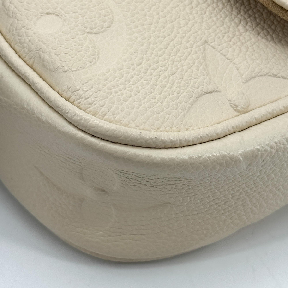 Louis Vuitton Monogram Empreinte Easy Pochette on Strap Cream