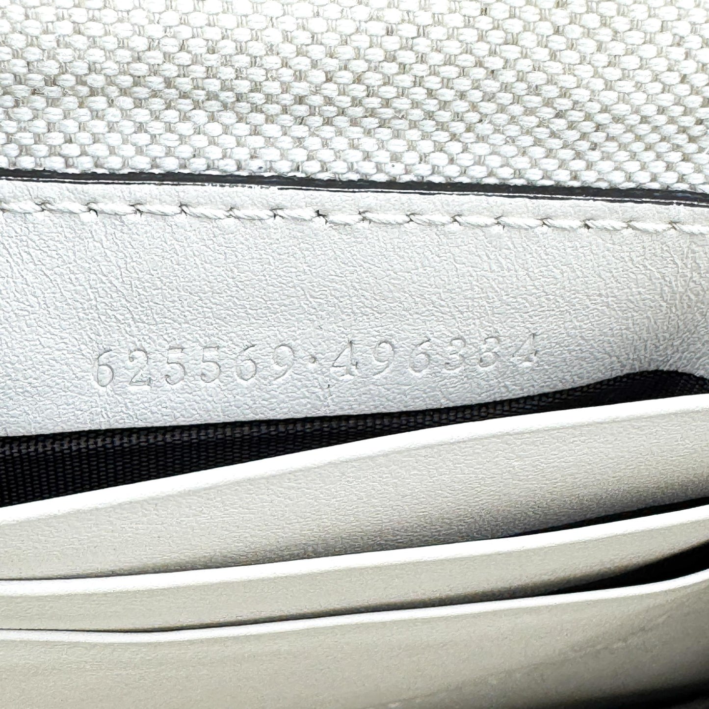 Gucci GG Embossed Leather Clutch White