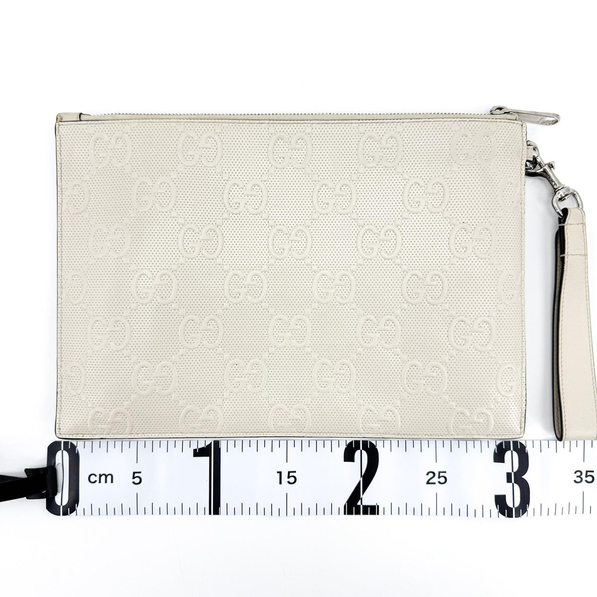 Gucci GG Embossed Leather Clutch White