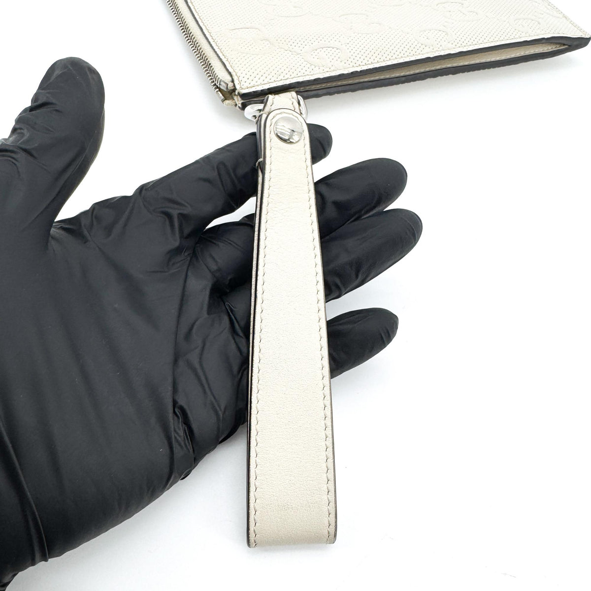 Gucci GG Embossed Leather Clutch White