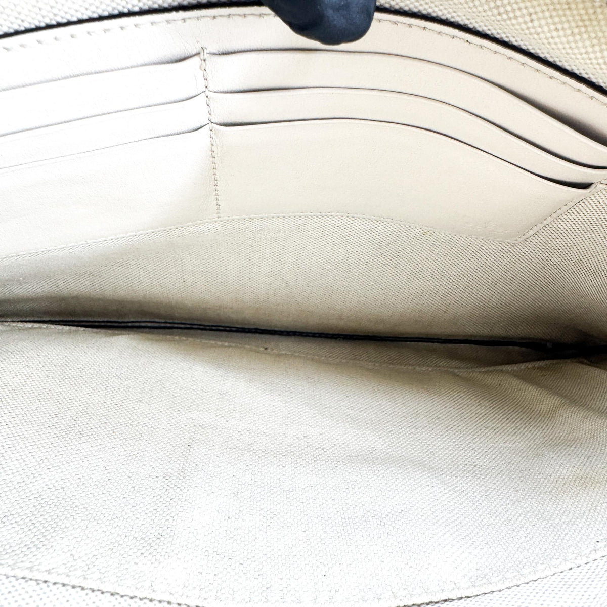 Gucci GG Embossed Leather Clutch White