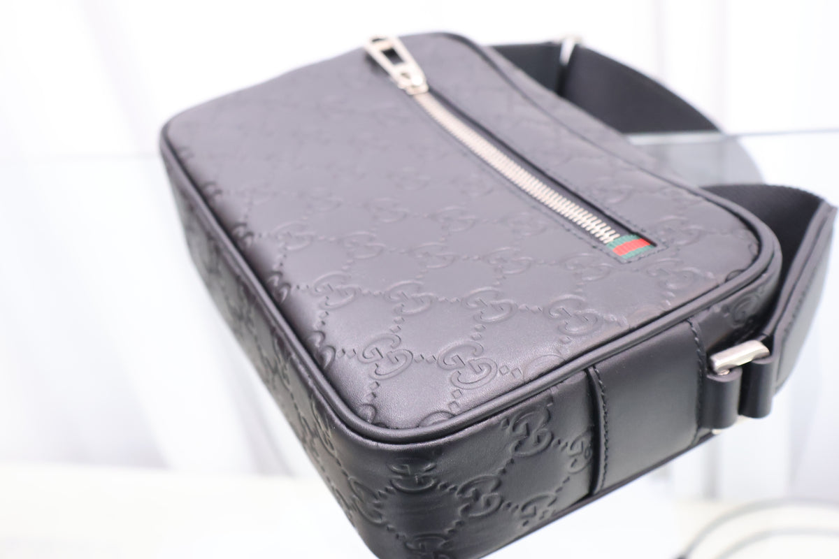 GG Emblem Small Black Crossbody Bag 850242