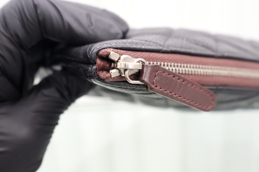 Caviar Medium Silver Hardware Clutch Black