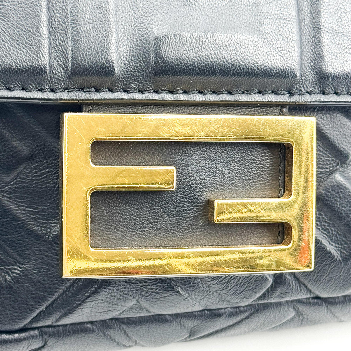 Fendi FF Embossed Baguette Mini Bag Black Gold Hardware