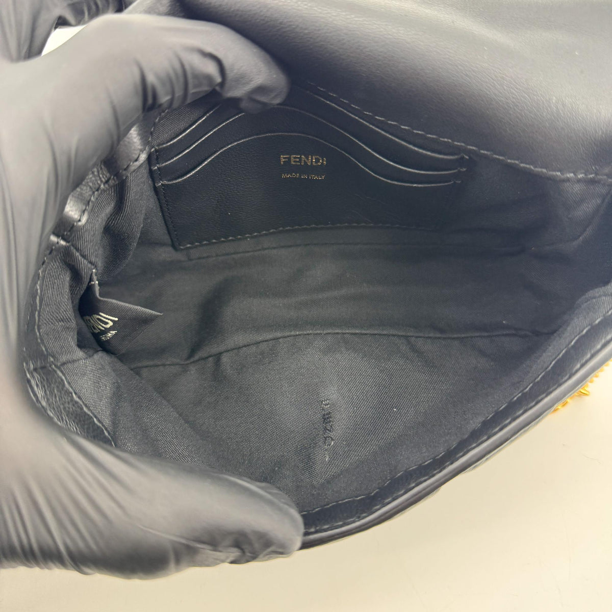 Fendi FF Embossed Baguette Mini Bag Black Gold Hardware