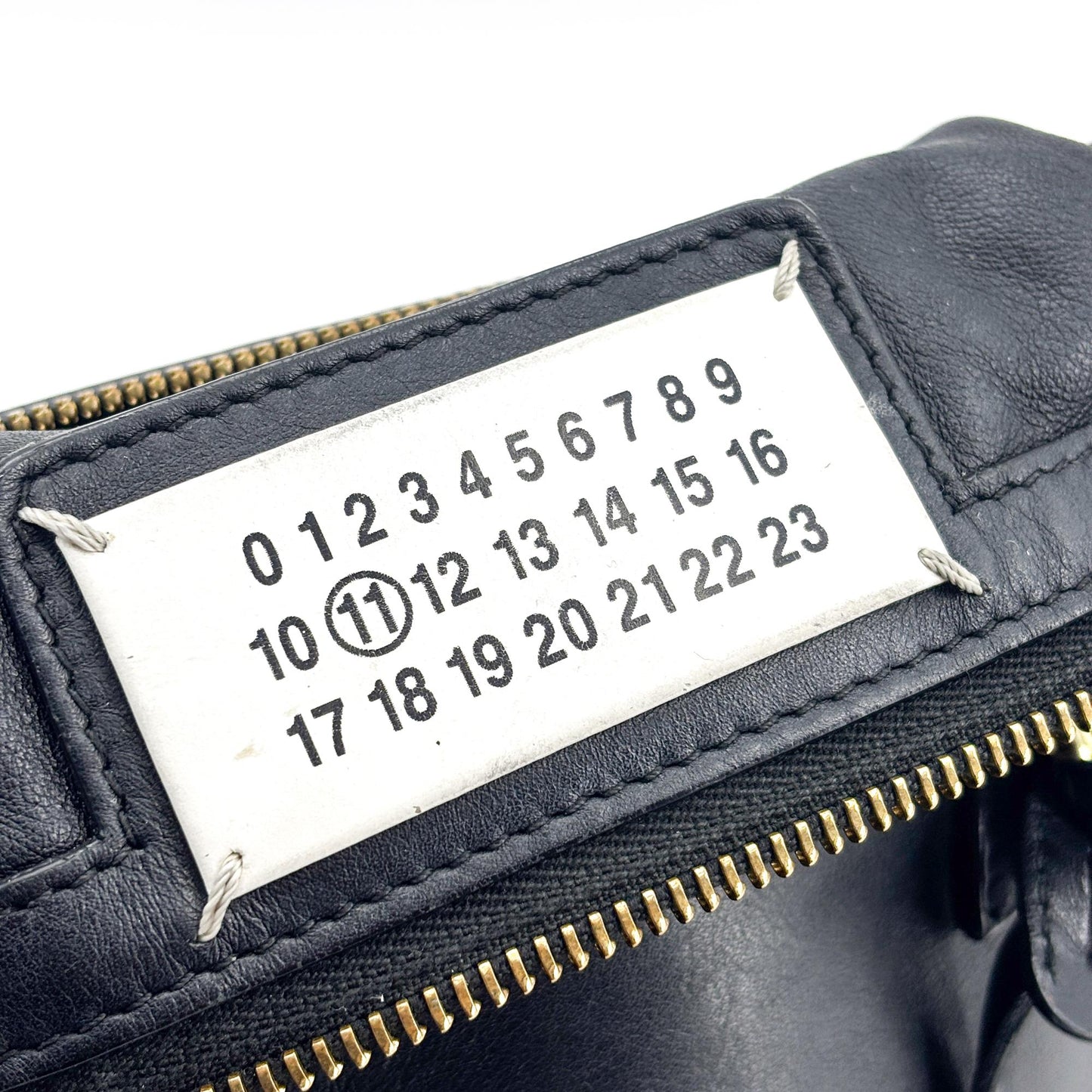 Maison Margiela's black 5AC mini tote bag