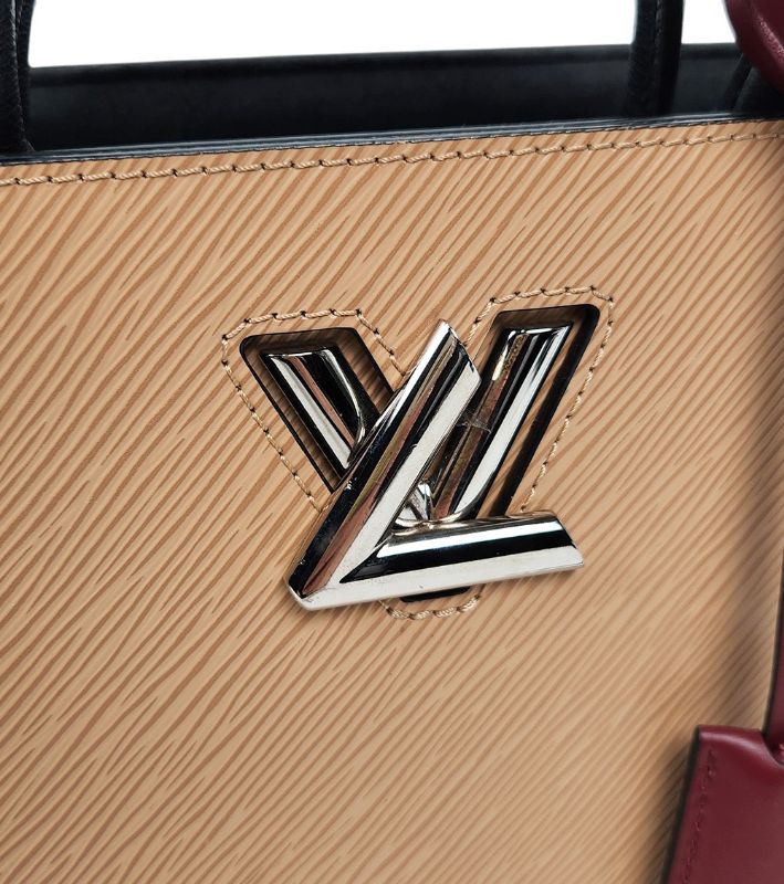 Louis Vuitton Beige Twisted Tote