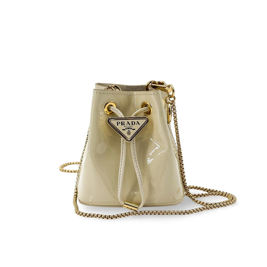 Prada Patent Leather Micro Bucket Bag Beige Gold Hardware