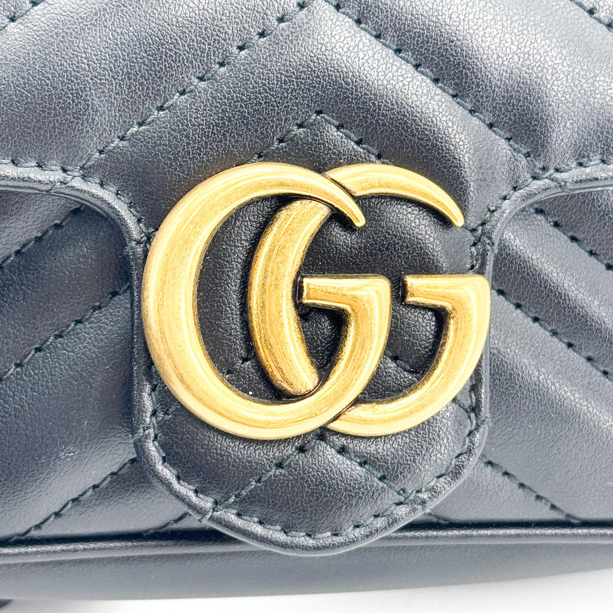 Gucci GG Marmont Matelassé Super Mini Crossbody Bag Black
