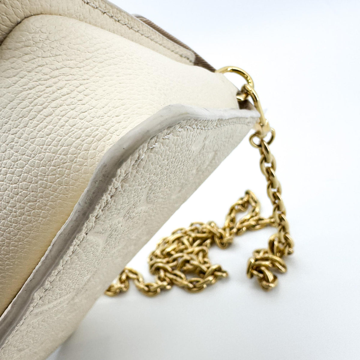 Louis Vuitton Monogram Empreinte Pochette Métis East West Chain Crossbody Bag Cream