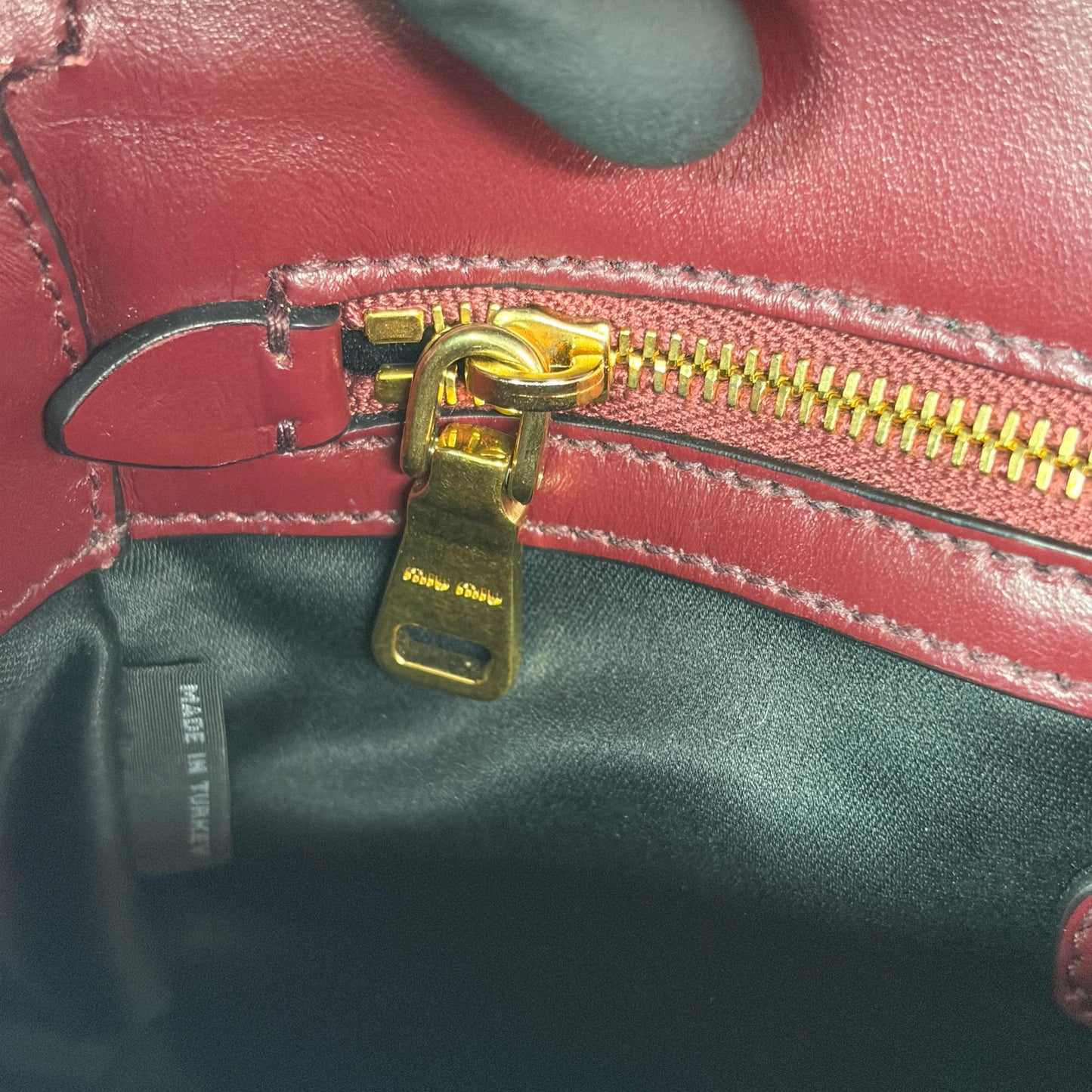 Miu Miu Madras leather shoulder bag in burgundy with gold hardware