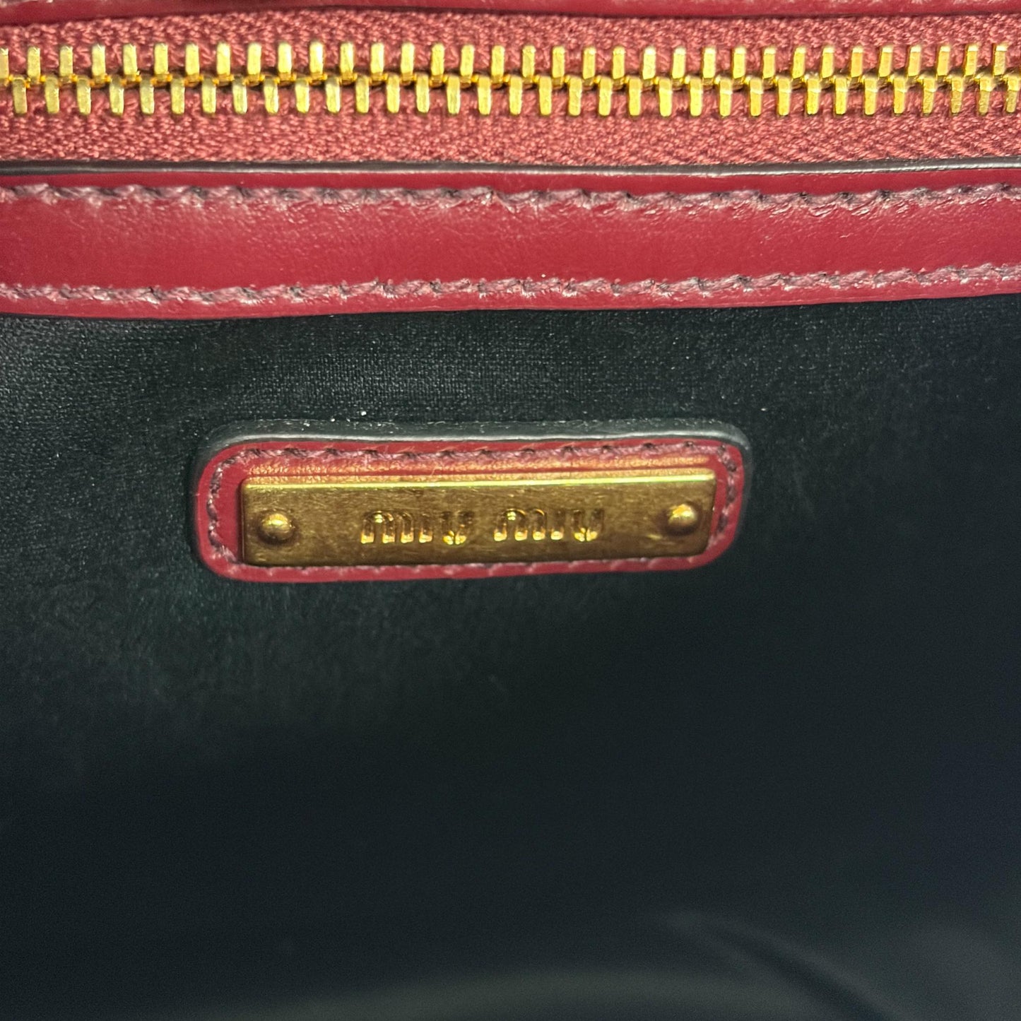 Miu Miu Madras leather shoulder bag in burgundy with gold hardware