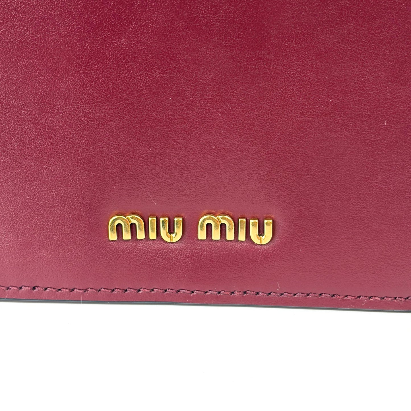 Miu Miu Madras leather shoulder bag in burgundy with gold hardware