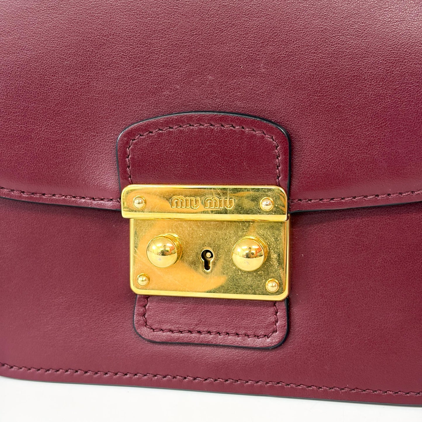 Miu Miu Madras leather shoulder bag in burgundy with gold hardware