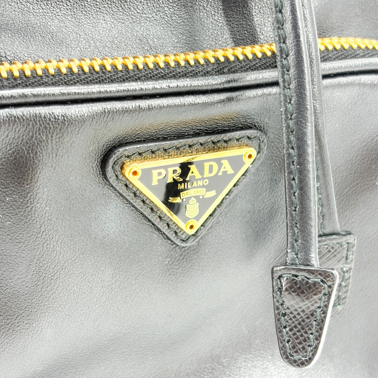 Prada leather bucket bag with gold hardware