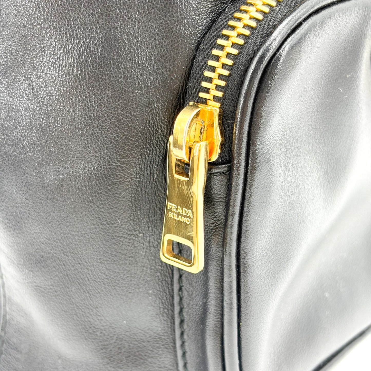 Prada leather bucket bag with gold hardware