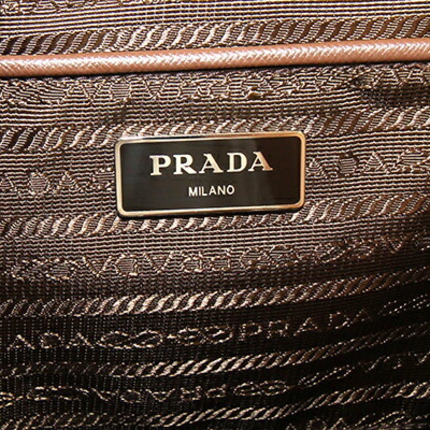 Prada brown nylon leather triangular backpack