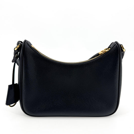 Prada Saffiano leather crossbody bag in black with gold hardware