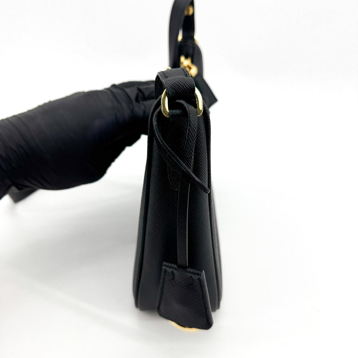 Prada Saffiano leather crossbody bag in black with gold hardware
