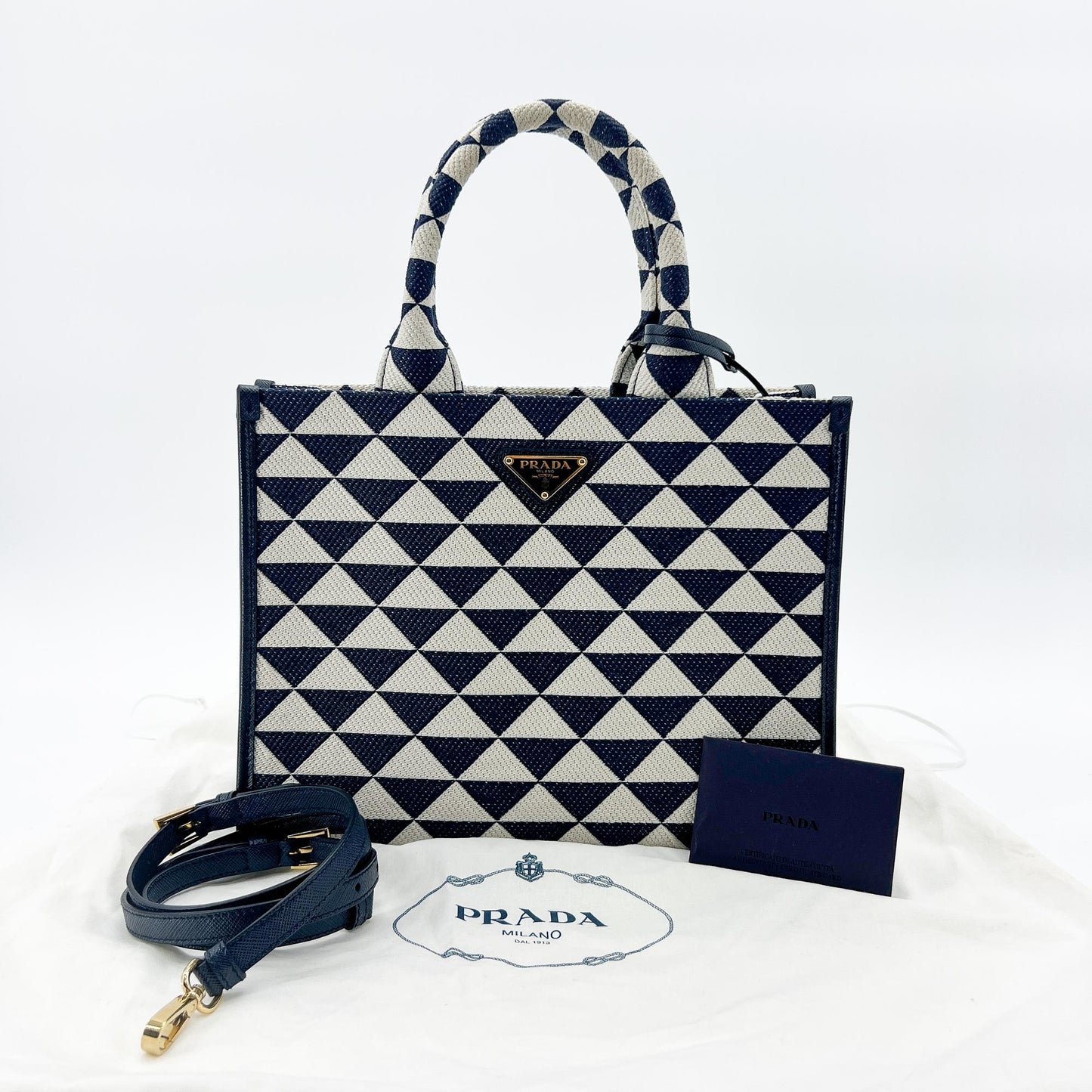 Prada symbol embroidered fabric tote bag