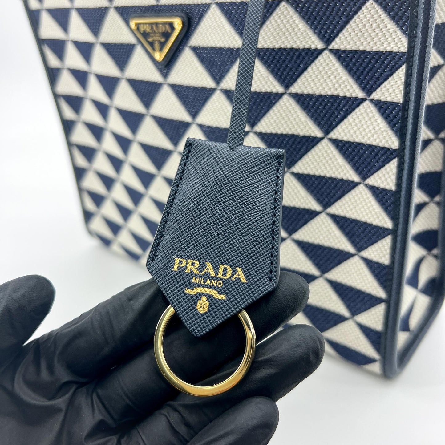 Prada symbol embroidered fabric tote bag