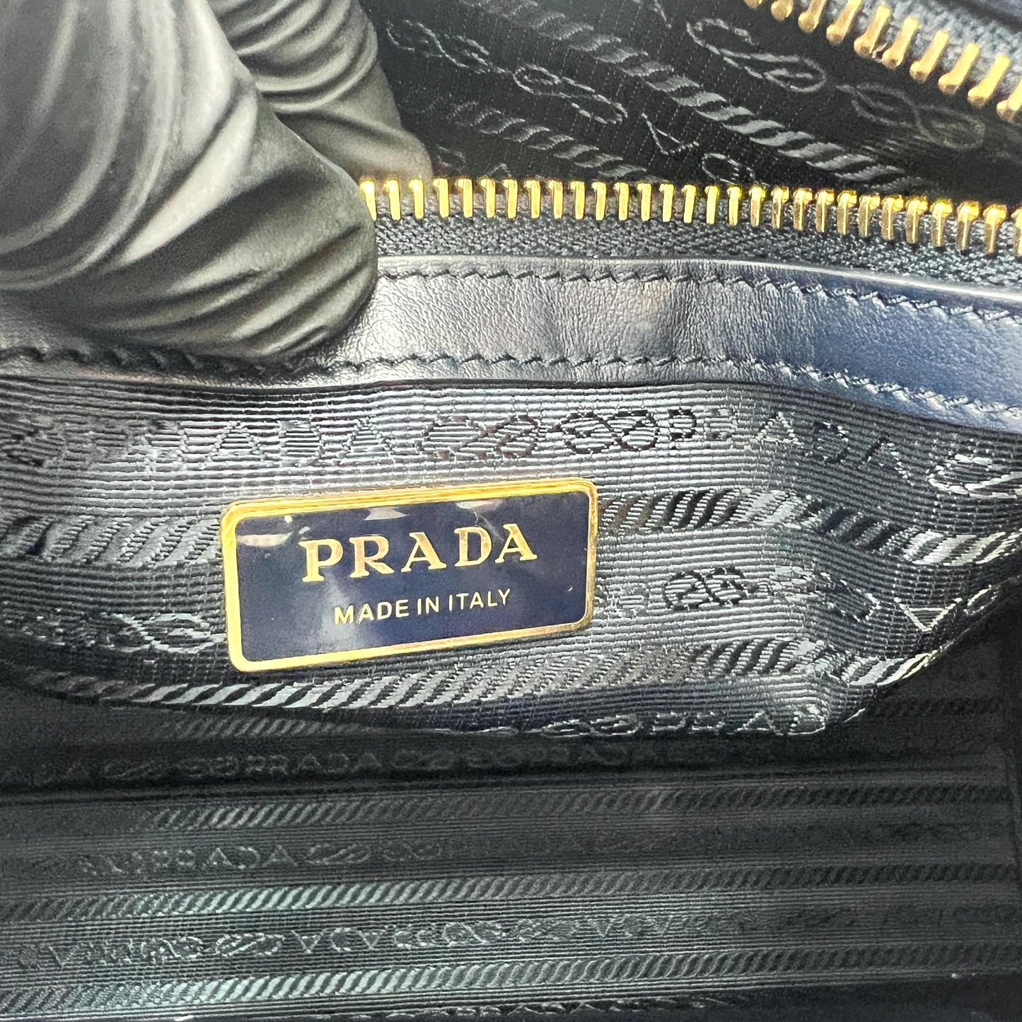 Prada symbol embroidered fabric tote bag