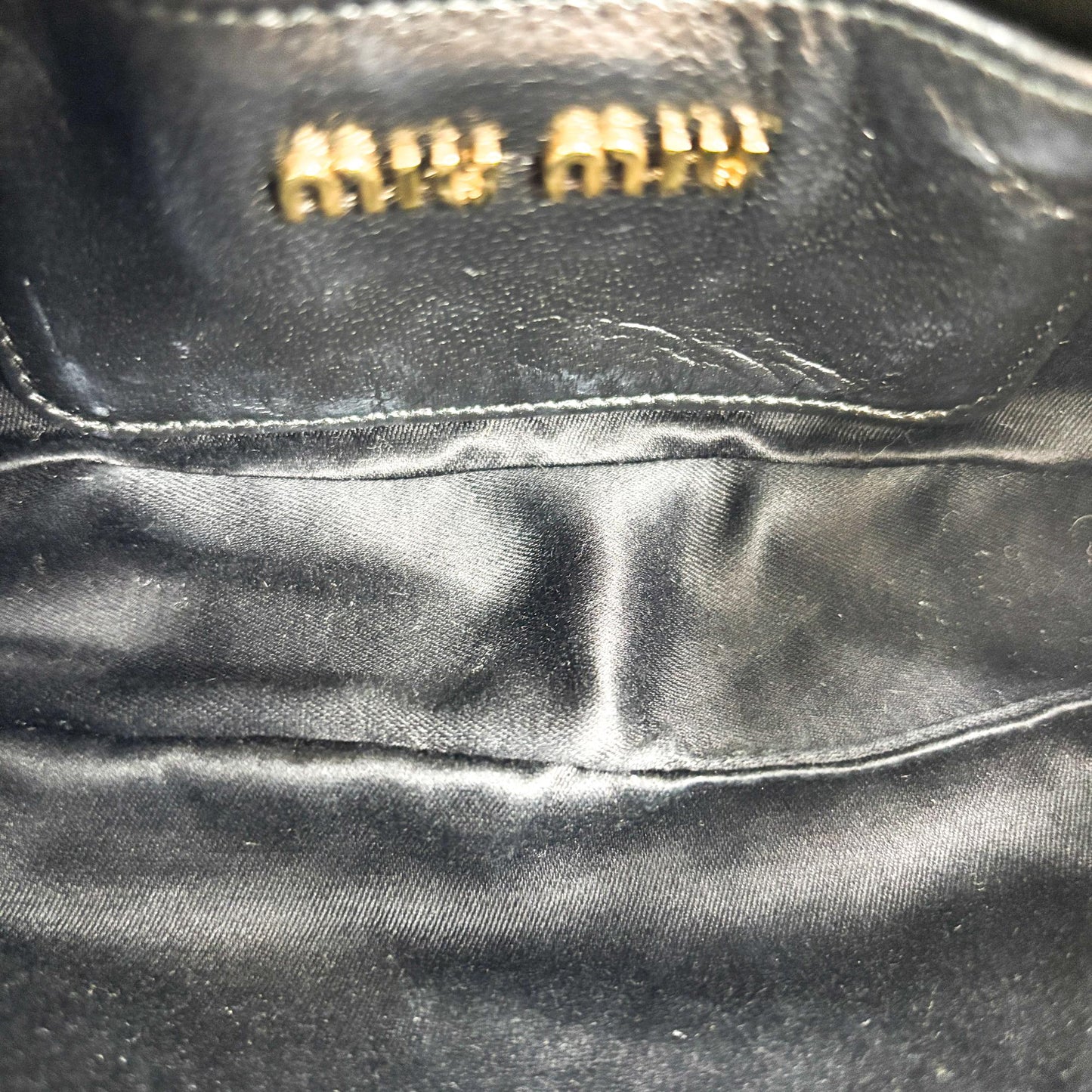 Miu Miu Matelassé Napa Leather Pouch Black