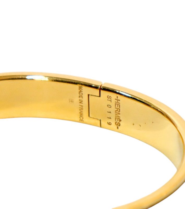 Hermès Black Click-Ash Gold Bracelet